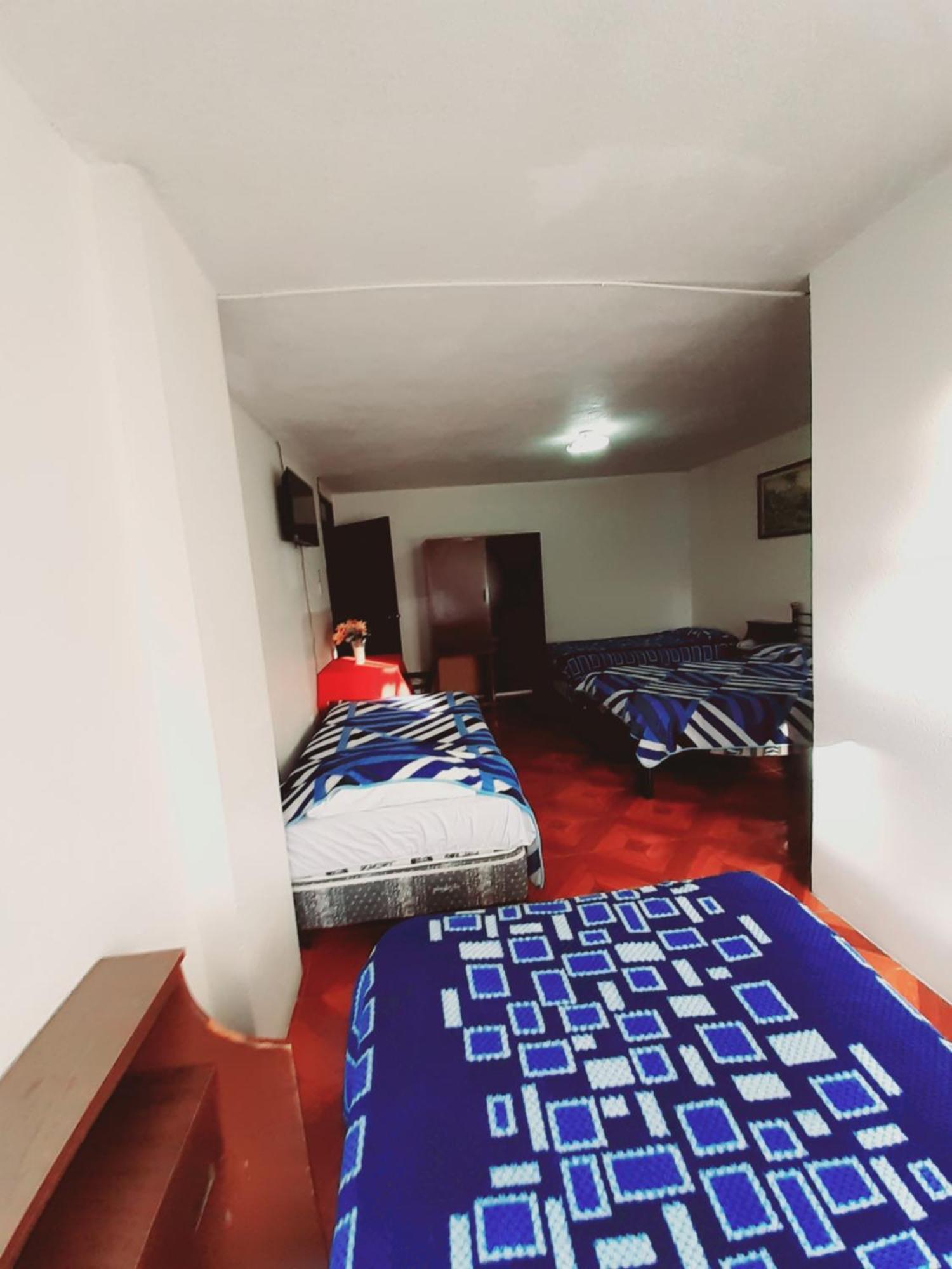 Hostal Central Latacunga Habitación foto